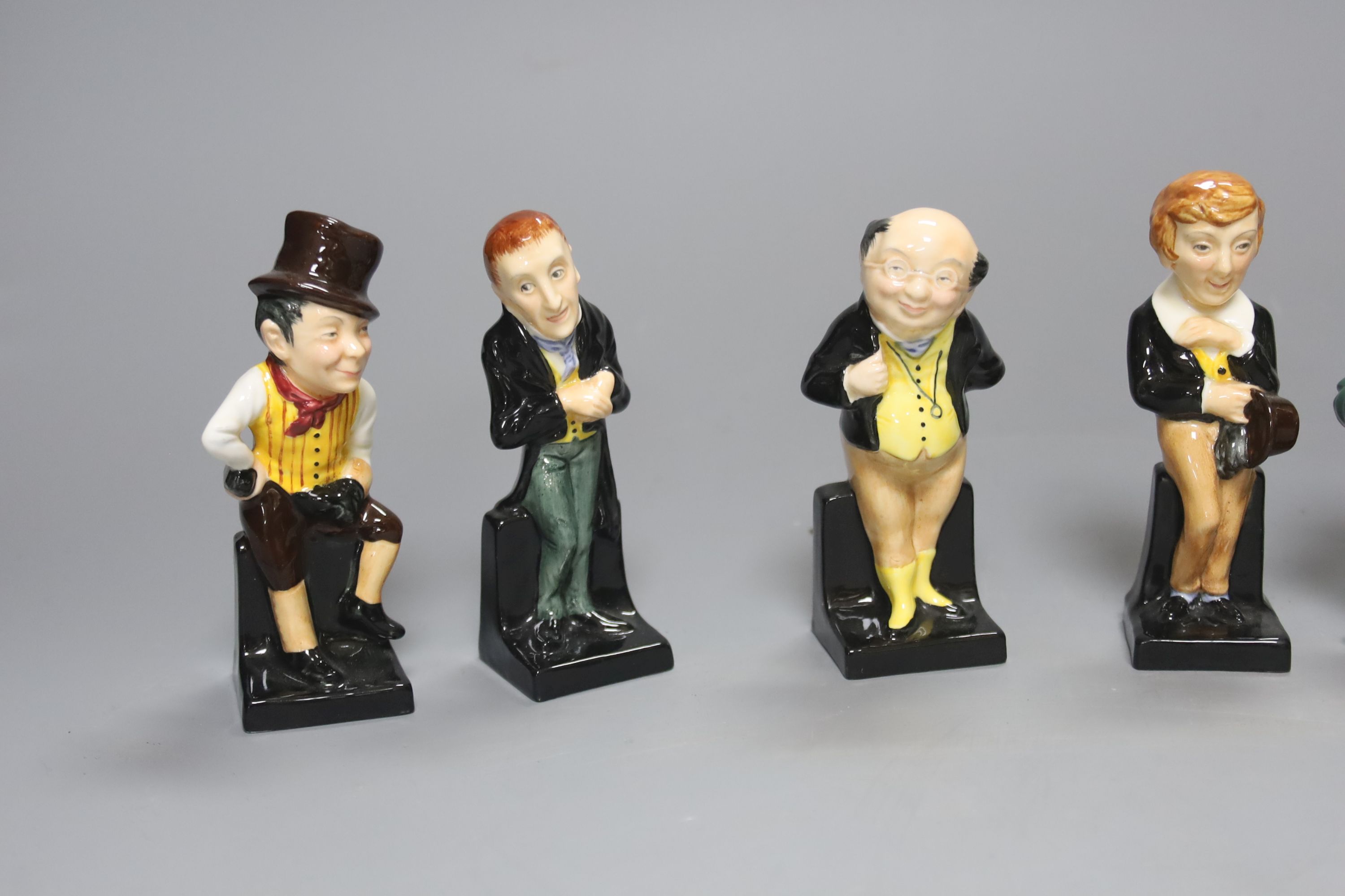 Seven Royal Doulton figures: Sam Weller, Sairey Gamp, David Copperfield, Pickwick, Fat Boy, Tony Weller and Uria Heep